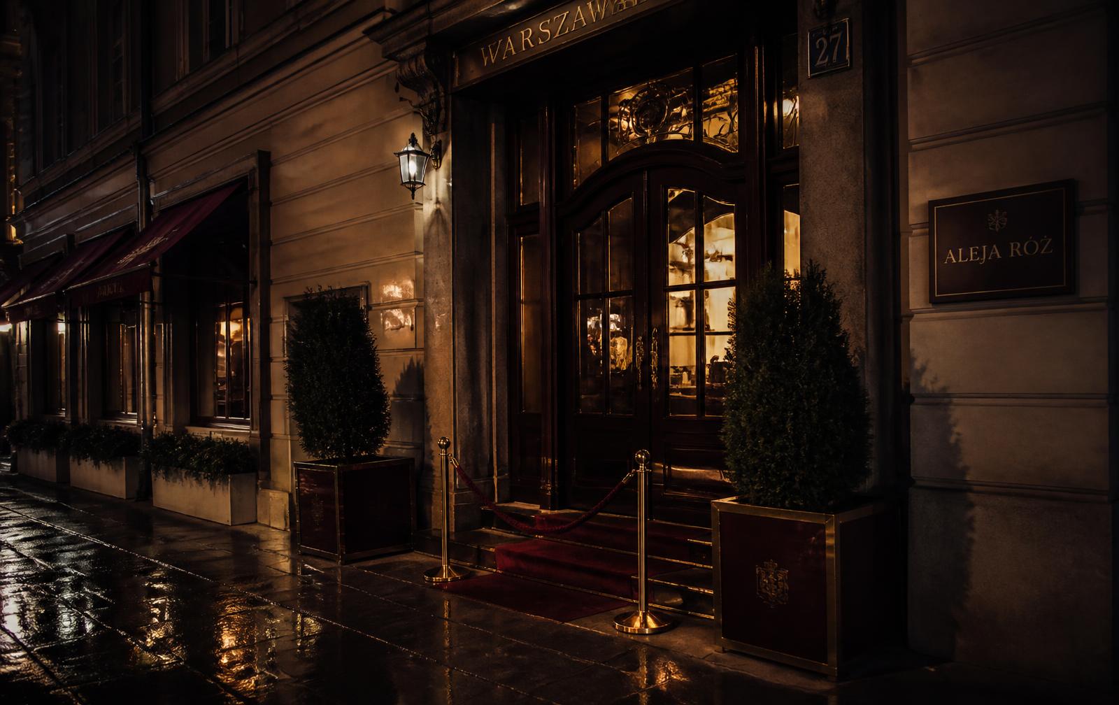 A lamplit doorway in central Warsaw at night